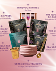 Cycle Support Tea Subscription: A collection for hormonal balance featuring loose leaf teas in mystical packaging, a pink ceramic tea bowl, gold scoop, strainer, and pink hourglass with labeled details—all displayed on a pink background.