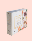The "Once Upon a Hive" product features "Blossom to Bottle" packaging with floral and honeycomb designs. Crafted by Bavarian Bee Company, it showcases vineyard honey and floral flavors on a pale pink background.