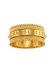 The Satya Jewelry Blessings Mantra Spinning Ring (sizes 6, 7, 8) features a beaded edge and "I AM BLESSED" engraving, crafted in 18KT gold plate.