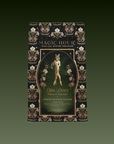 A decorative tea package labeled "Freya: The Radiant" features a golden female figure with flowers, ornate borders, and "She Rises: Jasmine Oolong Tea" on a dark background.