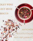 A top-down view of a glass containing a vibrant reddish-purple beverage with floral ingredients. Dried flower petals are scattered beside the glass. Text reads: "Garnet: Violet Wine Gemstone Wellness Tea" and "Antioxidant, Boosts Collagen, Anti-Inflammatory." Magic Hour's perfectly blended Loose Leaf Tea for a magical experience.