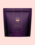 A purple resealable bag with gold stars and "Magic Hour" and "Mantra Mint™ Herbal Tea" text. This celestial, caffeine-free herbal tea packaging features a circular logo that evokes calm.