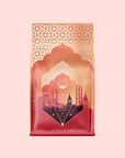 A decorative red and gold package of Turkish Delight with geometric mosque-inspired patterns, labeled “Turkish Delight,” evokes Istanbul vibes. Set against a light pink background. Net weight: 400g (17oz).