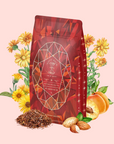 A vibrant red tea bag of Carnelian: Caffeine-Free Apricot Amaretto Tea sits among illustrated yellow calendula, a peach, shelled almonds, and rooibos leaves—evoking the essence of this fruity, nutty herbal blend.