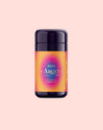 A dark purple canister labeled "555: Celestial Harmony: Papaya-Mango-Rose Tea with Ashwagandha" features a vibrant pink, orange, and yellow starburst design and promises ashwagandha-infused stress relief on a pale pink background.