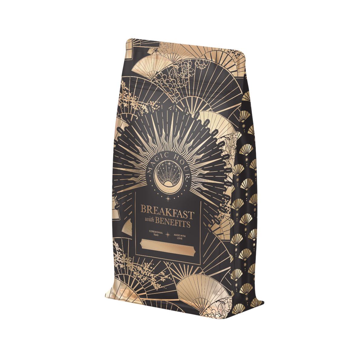 A stylish black and gold package, "Metabolism Balance: Breakfast with Benefits," features intricate fans and geometric shapes. The "Magic Hour" logo hints at bold black tea infused with metabolism-boosting spices made from organic ingredients.