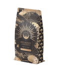 A stylish black and gold package, "Metabolism Balance: Breakfast with Benefits," features intricate fans and geometric shapes. The "Magic Hour" logo hints at bold black tea infused with metabolism-boosting spices made from organic ingredients.