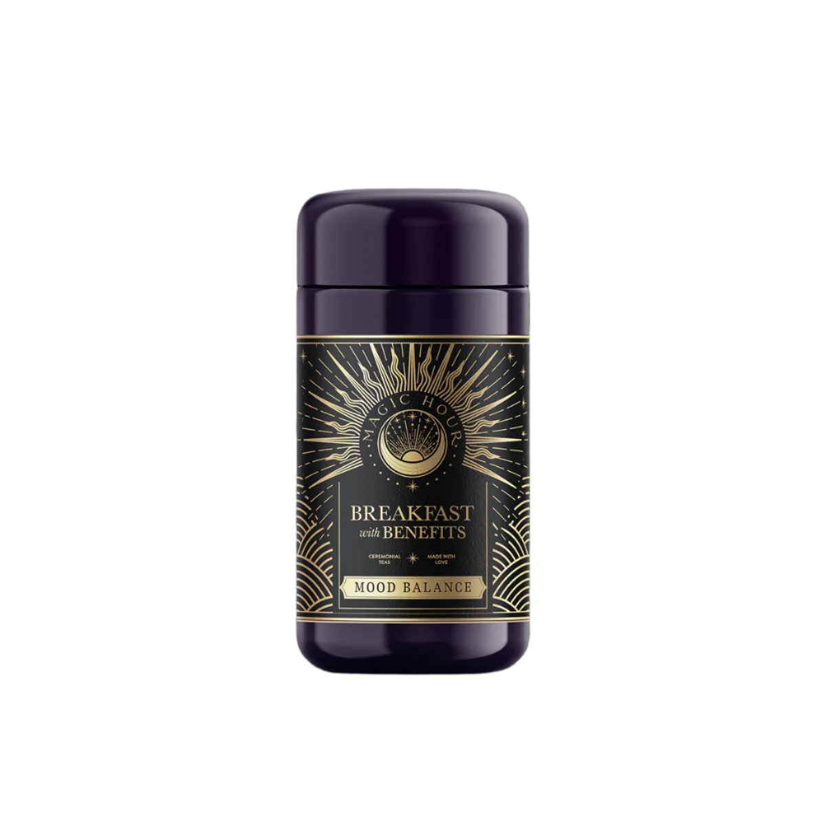 A dark cylindrical container labeled "Mood Balance: Breakfast with Benefits" showcases gold accents, an eye illustration, and sunburst patterns. Infused with calming Ashwagandha root, it provides a refined herbal breakfast tea experience.