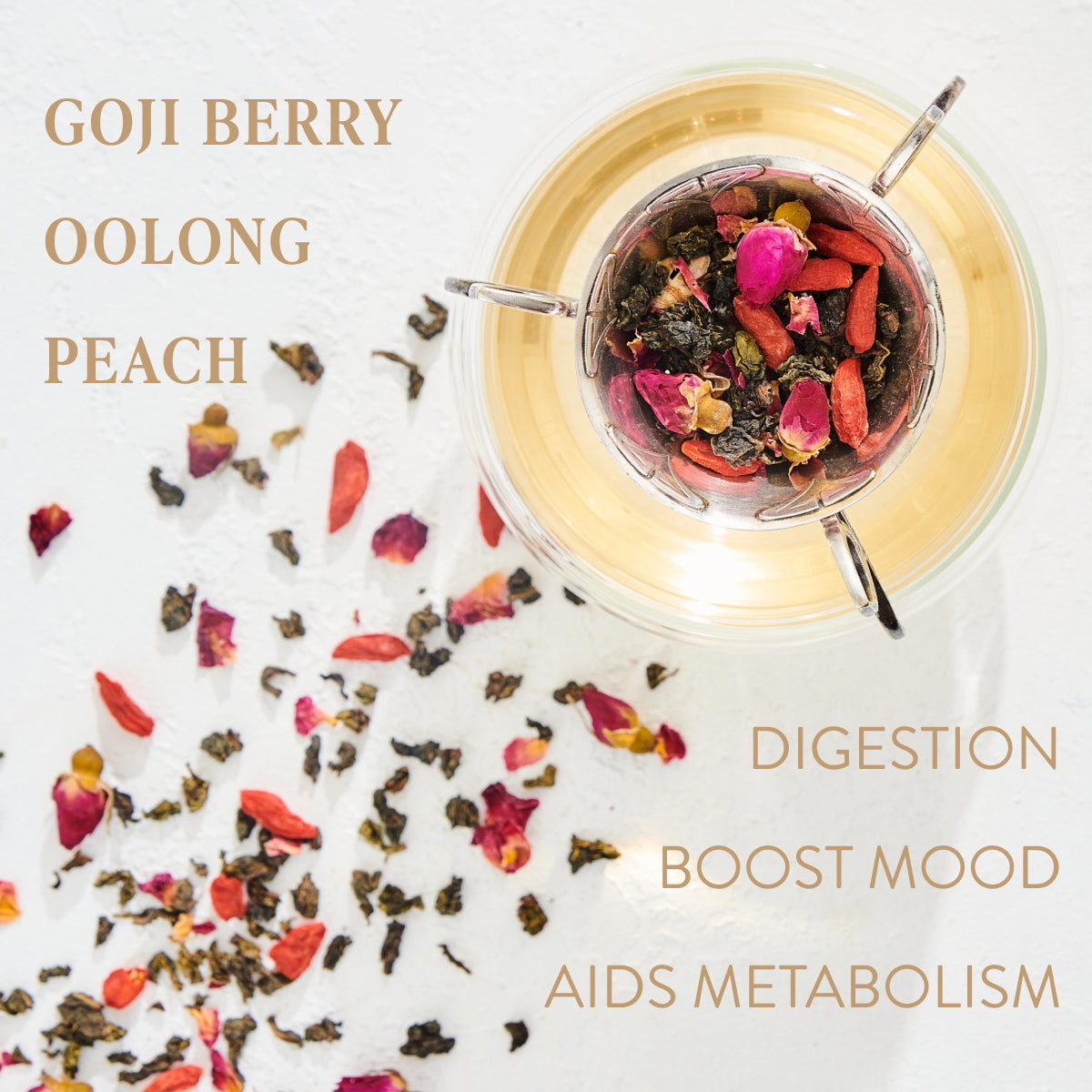A clear glass cup filled with tea, featuring colorful ingredients like goji berries, oolong leaves, and peach pieces. Scattered loose leaf tea and flowers are beside the cup. The text reads: "Renewal: Peach-Goji-Rose Oolong Tea Traveler," "Digestion. Boost Mood. Aids Metabolism," and "Organic Tea by Magic Hour.