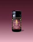 A beautifully designed tea package labeled "Aphrodite's Alchemy: Damiana & Rose White Tea," featuring an illustrated goddess of love from Greek mythology, surrounded by flowers and elegant gold accents.