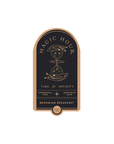 Introducing the Magic Hour Front Jar Label: a sophisticated black and gold arched label featuring an hourglass adorned with celestial designs. The text elegantly reads "Ceremonial Teas," "Made with Love," "Time for Infinity," and "Bohemian Breakfast." This standalone gold foil front jar label exudes elegance, making it the perfect addition to your tea jars.