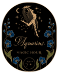 An artistic illustration from the "Magic Hour Front Jar Label" collection features a dancing figure in a pointed hat set against a black background adorned with twinkling stars and a crescent moon. Blue flowers and green leaves surround the figure, capturing the essence of the magic hour. The text reads "Aquarius," with "MAGIC HOUR" displayed below it like gold foil on a jar label.