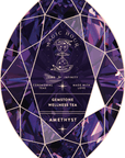 Magic Hour Front Jar Label has a jewel-shaped, stand-alone gold foil front design featuring a purple, faceted gem-like pattern. It includes the text: "Magic Hour," "Time for Infinity," "Ceremonial Teas," "Made with Love," and "Amethyst." An hourglass icon is also present.