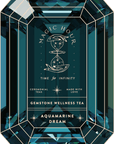 Label for Magic Hour Front Jar Label's "Aquamarine Dream" Gemstone Wellness Tea. It showcases a teal gemstone shape adorned with intricate illustrations and text: "Ceremonial Teas," "Made with Love," and "Time for Infinity" circling an hourglass graphic. This standalone gold foil front jar label will bestow your jars with timeless elegance.