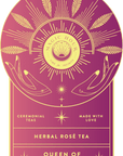 A vibrant, golden design on a purple backdrop showcasing the "Magic Hour" logo adorned with sun rays and leaves. The text includes: "Ceremonial Teas," "Made with Love," "Herbal Rosé Tea," and "Queen of the Tropics." Two hands encircle the central logo. Ideal for a standalone gold foil front jar label, this is the Magic Hour Front Jar Label.