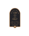 The Magic Hour Front Jar Label boasts a stunning black and gold design with an arched top. It prominently features the text "Magic Hour" at the top, "Time for Infinity" in the center, and "Silver Moon" at the bottom. This independent gold foil front jar label is adorned with a celestial theme of stars and moons, along with smaller text that reads "Ceremonial Teas" and "Made with Love.