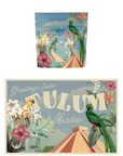 The image showcases the Travel to Tulum Gift Set, which includes a package and a postcard. Both items feature vibrant designs with parrots, tropical plants, and a pyramid, all set against a light blue sky. The postcard bears the text "Greetings from Tulum, Mexico," while the package shares a similar design without any text.