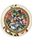 The Creatures of Curiosity - Tea Ceremony Cake Stand is a fashionable piece adorned with a vibrant floral pattern showcasing roses, morning glories, and other colorful flowers alongside butterflies. The border flaunts bold patterns featuring a leopard print and a gold snake design that encircles the floral center, perfectly embodying the essence of the Creatures of Curiosity collection.