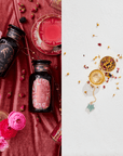 A split image showcases two distinct arrangements from the Cosmic Gemstone Apothecary Gift Set. On the left, luxurious dark bottles rest elegantly on rose-colored fabric adorned with flowers and accompanied by a pink drink, exuding the opulence of elegance. On the right, an open gold compact spills dried flowers next to a jade-colored pendant on a pristine white background.