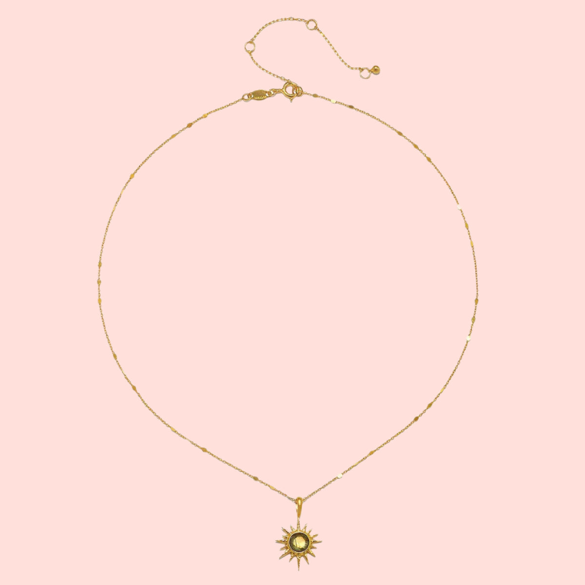 16" Labradorite North Star Necklace featuring a delicate chain and a sun-shaped pendant with a central labradorite stone, shown on a white background.