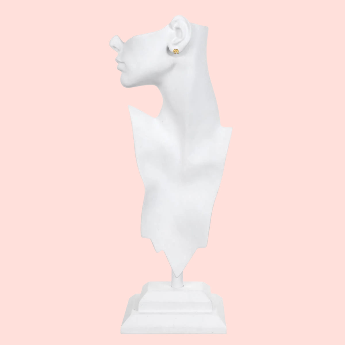 A white mannequin bust in a modern, abstract style showcases an Elephant Stud Earring, plated in 18k gold, on its left ear against a plain white background.