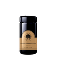 A black "School of Magic Monthly Tea Subscription Box - Traveler Jar" from the Elemental Tea Series, with gold and black detailing, is displayed against a plain light background.