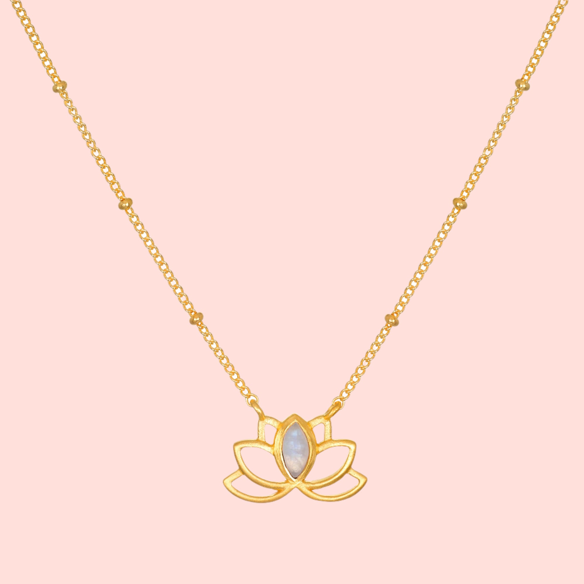 The Satya Jewelry Open Lotus moonstone necklace features a gold-plated lotus flower pendant with a shimmering moonstone center, shown on a white background.