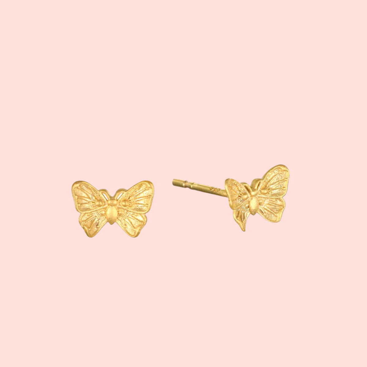 The Freedom to Soar Butterfly Stud Earrings, crafted with lustrous 18k gold plate, are shown on a white background from both front and side angles—ideal for anyone inspired by transformation-themed jewelry.