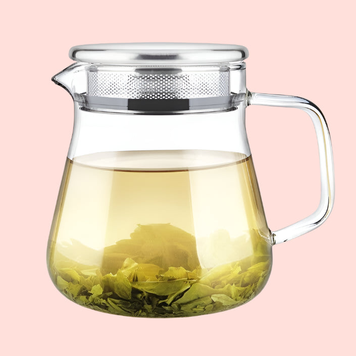 The Teabloom One-touch Tea Maker (15 oz) features a clear glass body, metal lid, and infuser—perfect for showcasing light teas and leaves as they steep. Enjoy a pure, elegant brewing experience with this beautifully crafted 1–2 cup design.