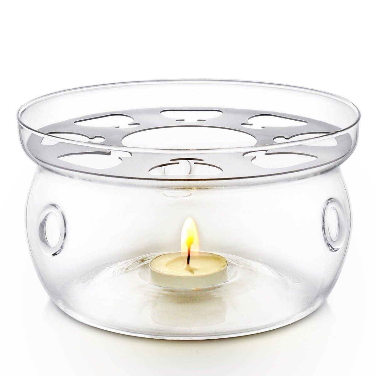 The Teabloom - UNIVERSAL Large Tea Warmer is a clear warmer with a metal plate and lit tealight inside, designed to keep teapots or cups warm.