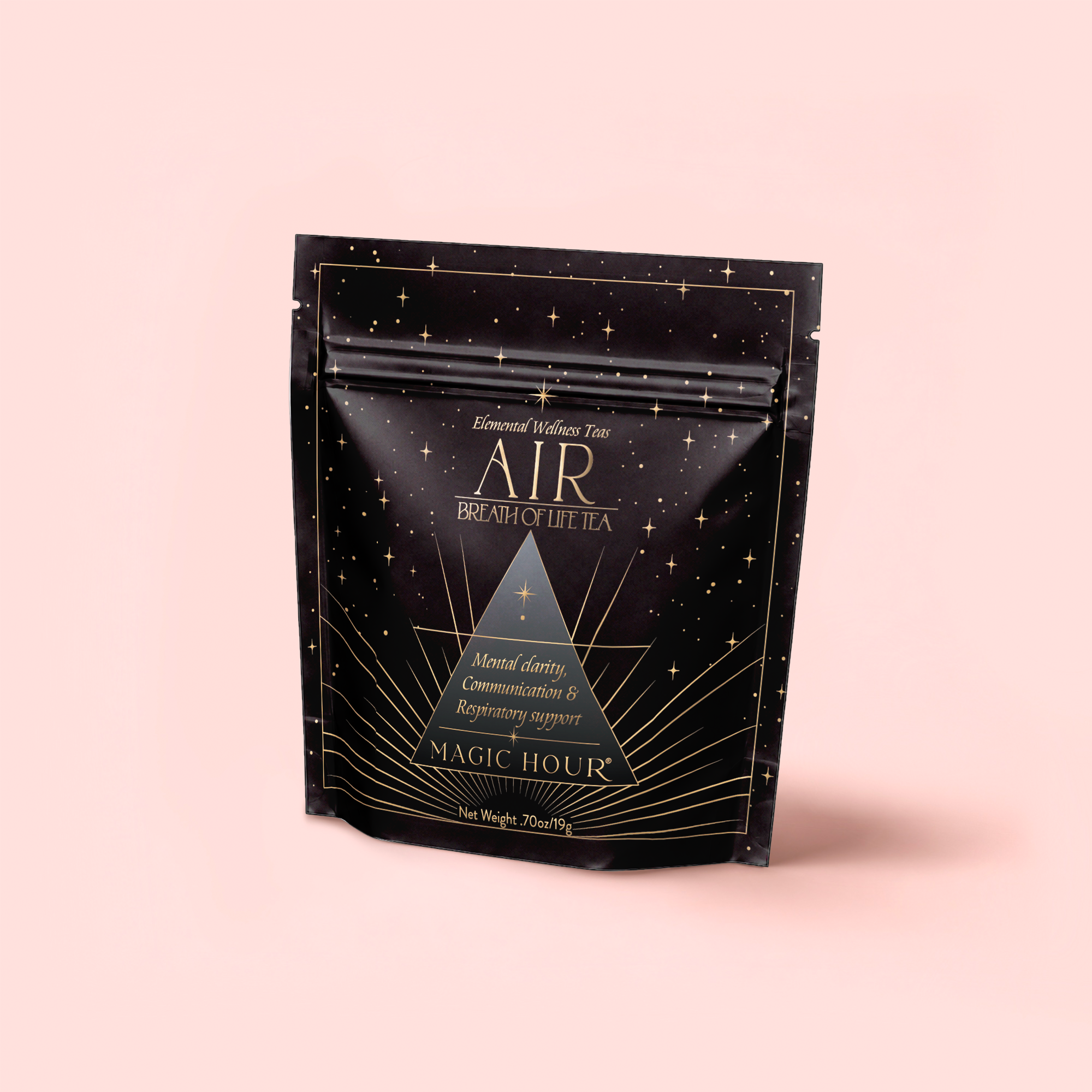 A black and gold resealable bag labeled "Air: Mint, Mullein & Citrus Tea for Respiratory Support" by Magic Hour, featuring star and line designs, with decaf green tea to support clarity, communication, and respiratory wellness.