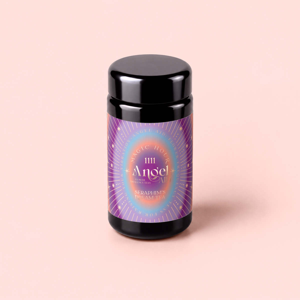 A black jar with a colorful, radiant label reading “111” and “Lavender-Jasmine-Pineapple Herbal Tea with Blue Lotus” sits on a pale pink background. The label, adorned with purple, blue, and gold decorative details, hints at the enchanting blue herbal tea within—an infusion inspired by Egyptian blue lotus and enhanced with lavender, jasmine, and pineapple notes.