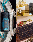 A collection of tea-themed items: On the left, a decorative tin of tea on a tray adorned with turquoise beads. At the top right, an Opalite Moon Tea Strainer sits next to a box labeled "Opal Moon Tea." The bottom right showcases a blue and gold box with the inscription "Magic Hour." The festive decor hints at an Aquamarine March Birthstone Mini Gift Set.