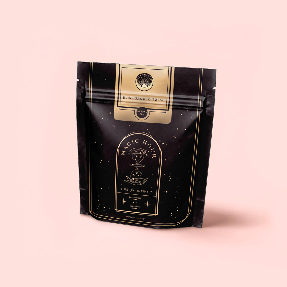 A black and gold resealable pouch labeled “Bliss: Sacred Tulsi Adaptogen Tea” with an hourglass design, set against a light pink background. The package features celestial and infinity-themed graphics, highlighting Tulsi (Holy Basil) as a natural sleep aid.