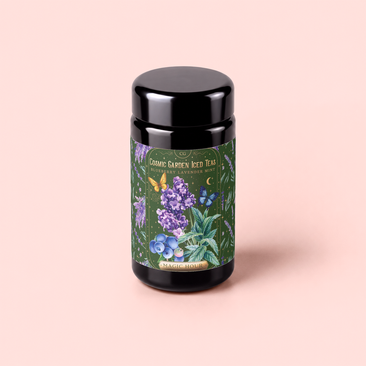 A canister of Blueberry Lavender Mint: Cosmic Garden Iced Tea from Magic Hour, decorated with a vibrant label displaying lavender, mint, and blueberries against a green background, rests on a pale pink surface. This sugar-free blend is ideal for savoring an antioxidant-rich iced tea at any time of day.