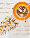 Overhead view of a loose leaf tea with dried ingredients, including apricot slices, amaretto bits, and cinnamon pieces. Text reads: "Carnelian : Caffeine-Free Apricot Amaretto Tea" and "Aids Immunity," "Reduce Cortisol," and "Anti-inflammatory." Experience the benefits of Magic Hour.