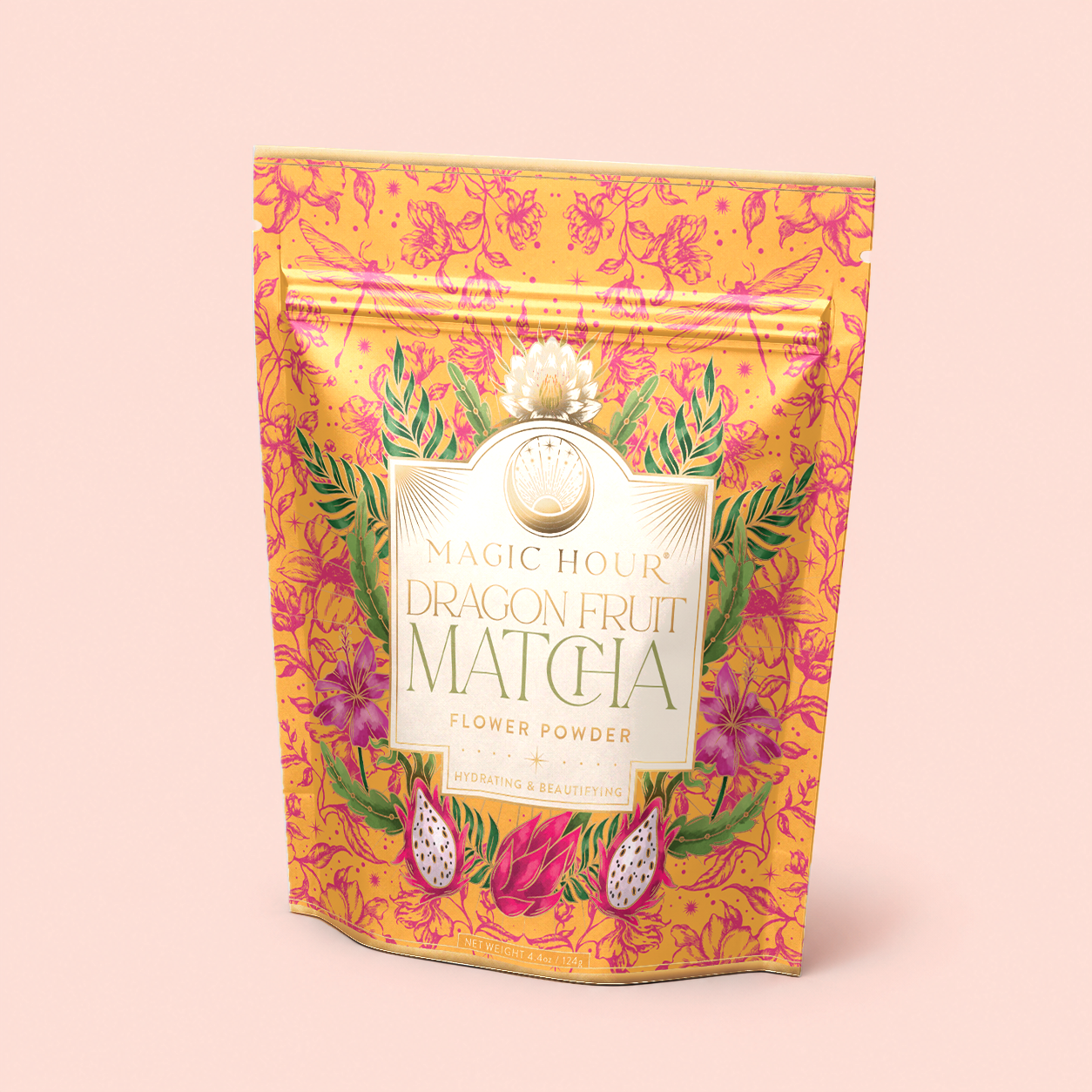 A vibrant pouch labeled "Flower Powder: Dragon Fruit Matcha," adorned with floral patterns, dragon fruit artwork, and a gold-highlighted label on a peach background, captures the lively essence of this blend, which combines juicy dragon fruit with premium ceremonial matcha to support gut health.
