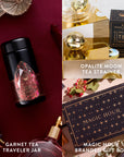 A beautifully arranged collage showcases the Garnet January Birthstone Mini Gift Set, which includes an elegant tea traveler jar, a charming tea strainer, and a branded gift box. The set is presented on dark, textured surfaces adorned with golden spheres and floral elements that highlight its gemstone wellness theme.