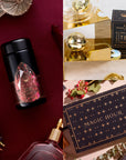 A collage of tea-related products featuring a black tea tin with a geometric design, a gold tea infuser alongside the Garnet January Birthstone Mini Gift Set, and a box with "Magic Hour" in gold lettering, all set against a backdrop of festive and elegant settings.