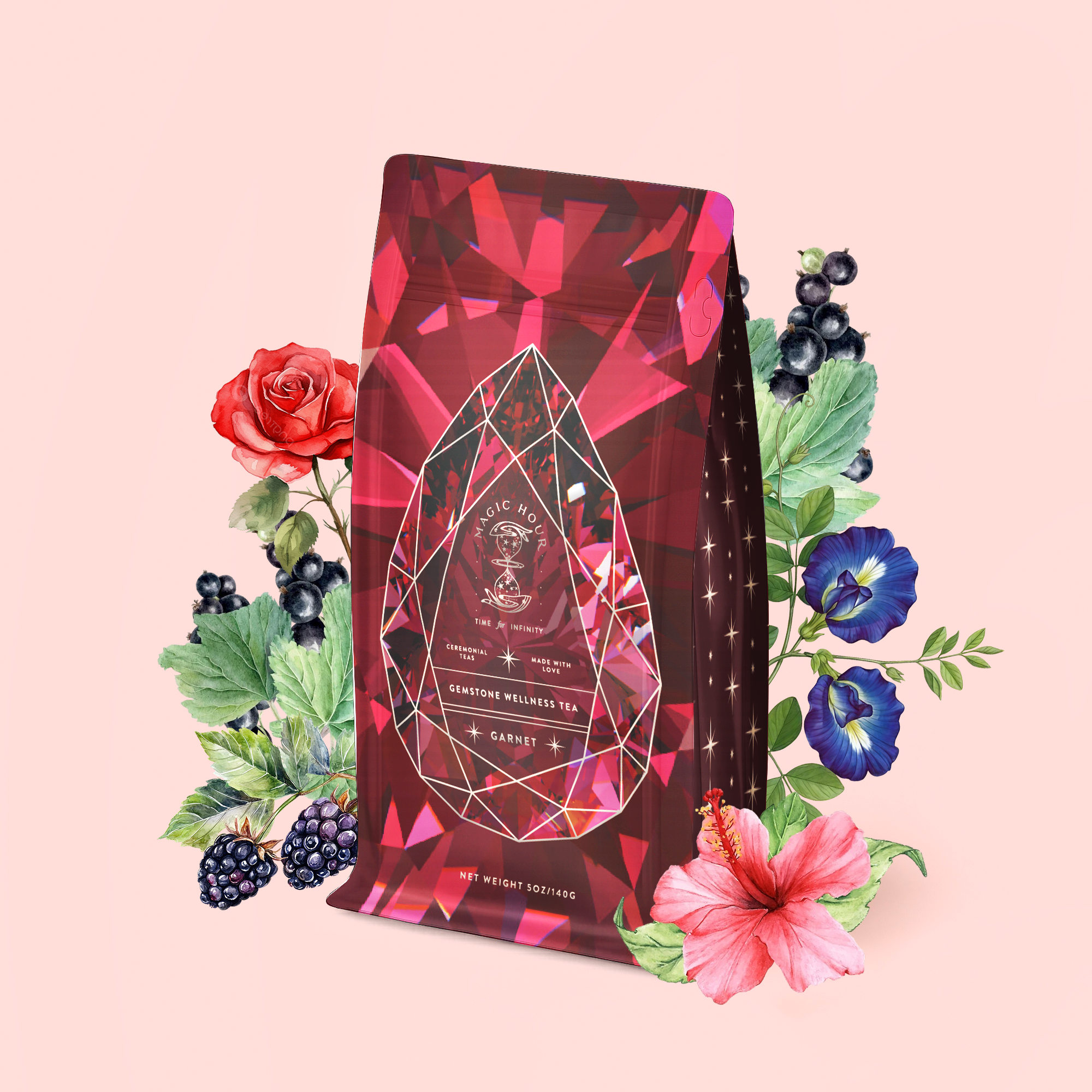A red tea package adorned with a crystal design is surrounded by illustrated flowers, berries, and leaves on a pale pink background. The label reads “Gemstone Wellness Tea • Garnet: Violet Wine,” inviting you to experience this vibrant organic herbal potion—Garnet: Violet Wine Gemstone Wellness Tea—crafted for vitality and balance.