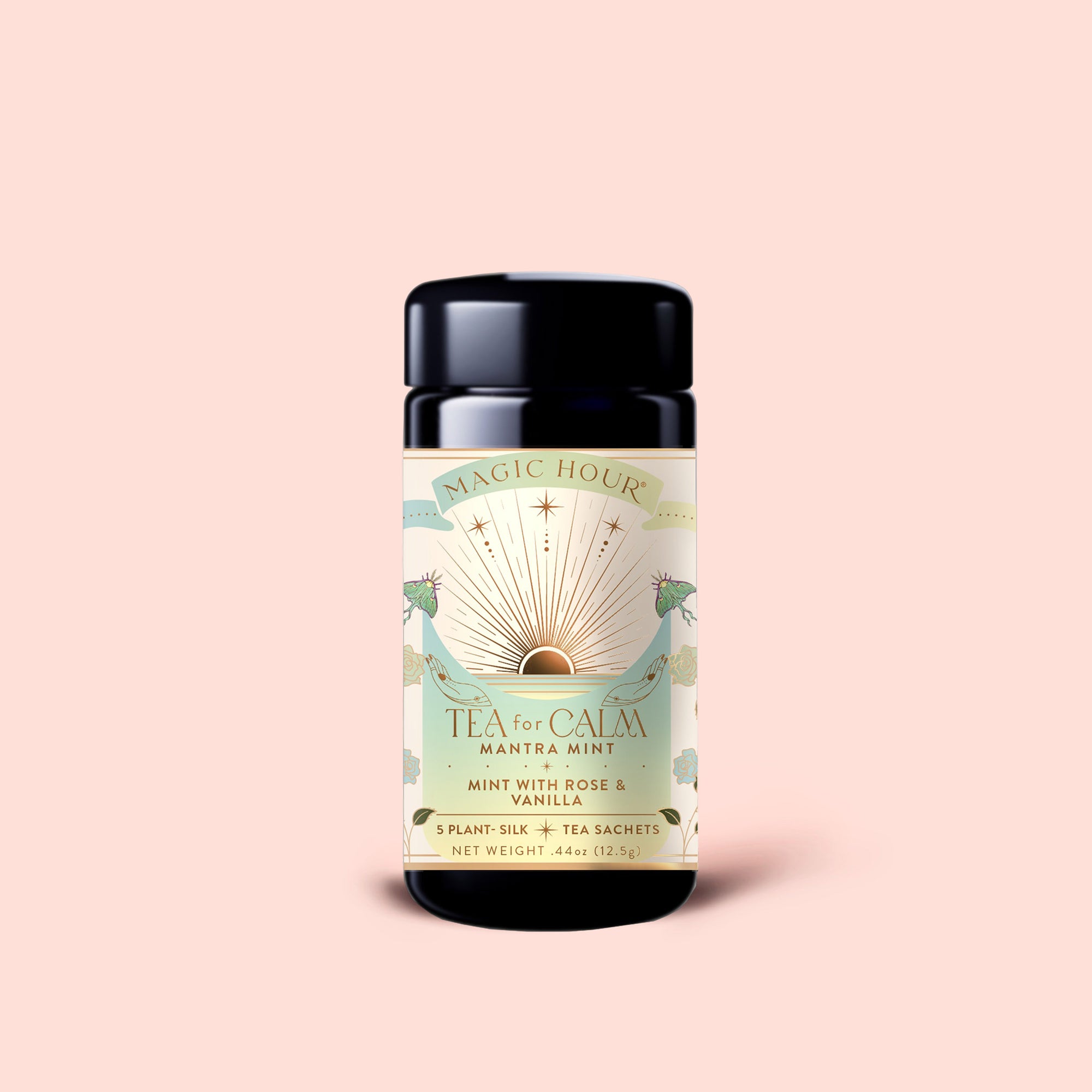 A light pink container of Tea for Calm: Mantra Mint—organic herbal tea with mint, rose, and vanilla. The sun and floral-illustrated label notes 5 plant-silk sachets inside, making this a soothing choice.