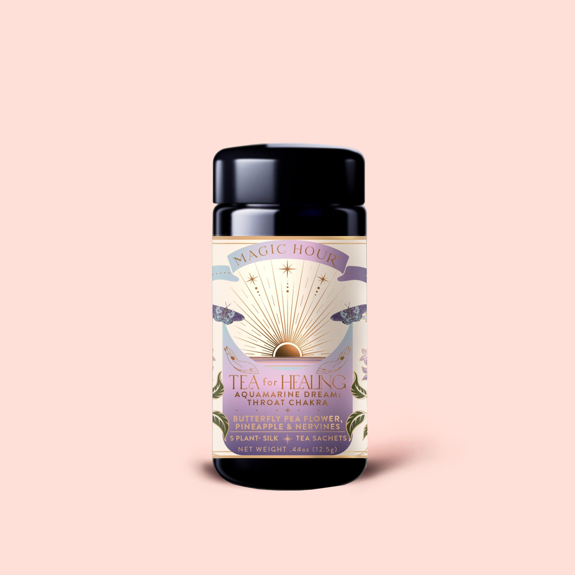 A black tea canister labeled "Tea for Healing: Aquamarine Dream" features sun and floral artwork on a light pink background. This adaptogen herbal tea blend combines blueberries, pineapple, and nervines to offer gentle nervous system support, with 12 tea sachets inside.