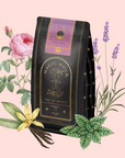 A black and gold "Child’s Pose™ Herbal Adaptogen Tea Blend for Sleep & Restful Calm" package is surrounded by illustrated pink rose, lavender, vanilla, and mint on a light pink background, highlighting its organic aromatherapeutic appeal.
