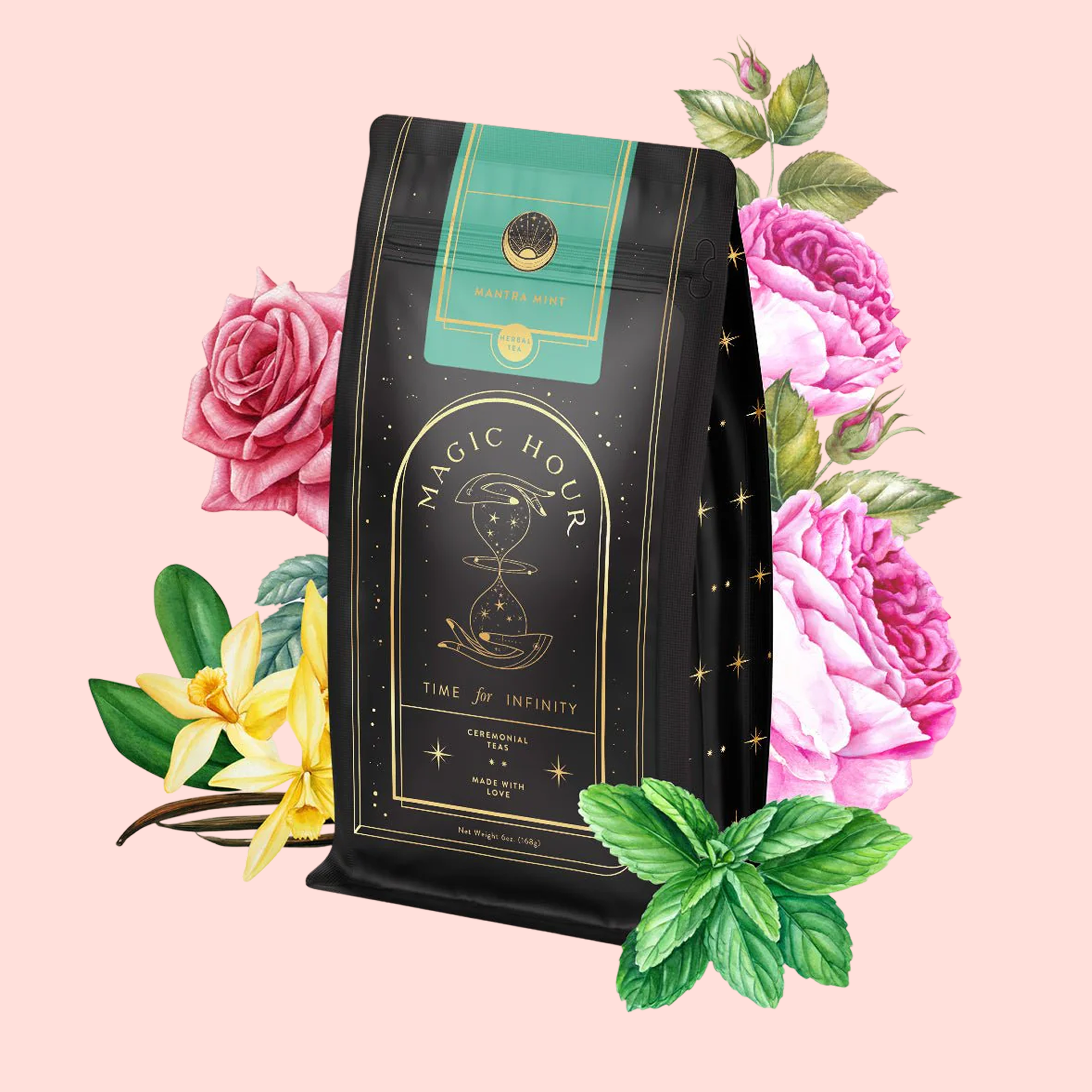 A black and green Mantra Mint™ Herbal Tea package labeled "Magic Hour" is surrounded by illustrated pink roses, yellow vanilla flowers, and green mint leaves on a pale pink background. This herbal blend is caffeine-free.