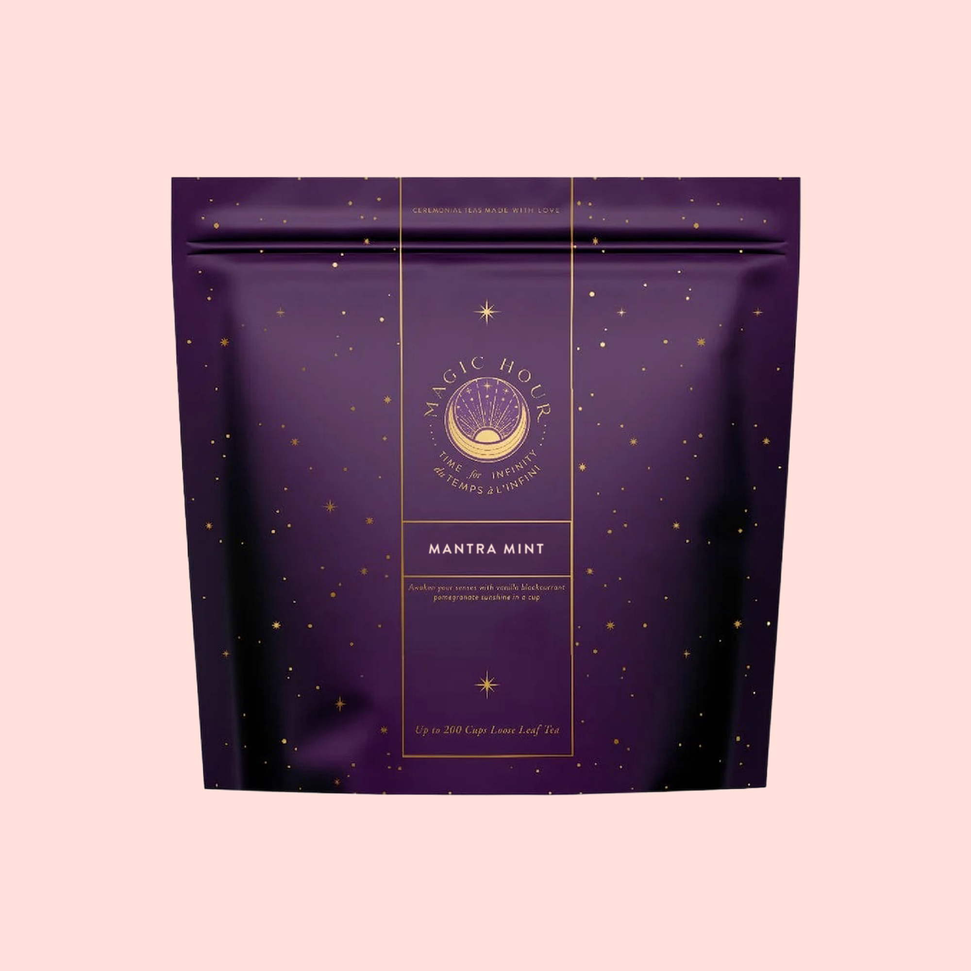 A purple resealable bag with gold stars and "Magic Hour" and "Mantra Mint™ Herbal Tea" text. This celestial, caffeine-free herbal tea packaging features a circular logo that evokes calm.