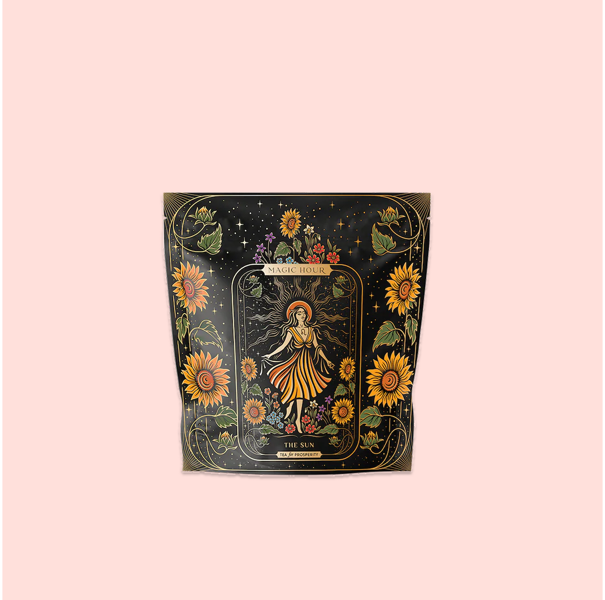 A decorative tea package features an illustrated woman in a dress among sunflowers with floral and celestial designs on black, set against soft pink. The label reads "The Sun: Energizing Adaptogenic Herbal Tea with Yaupon, Moringa &amp; Turmeric.