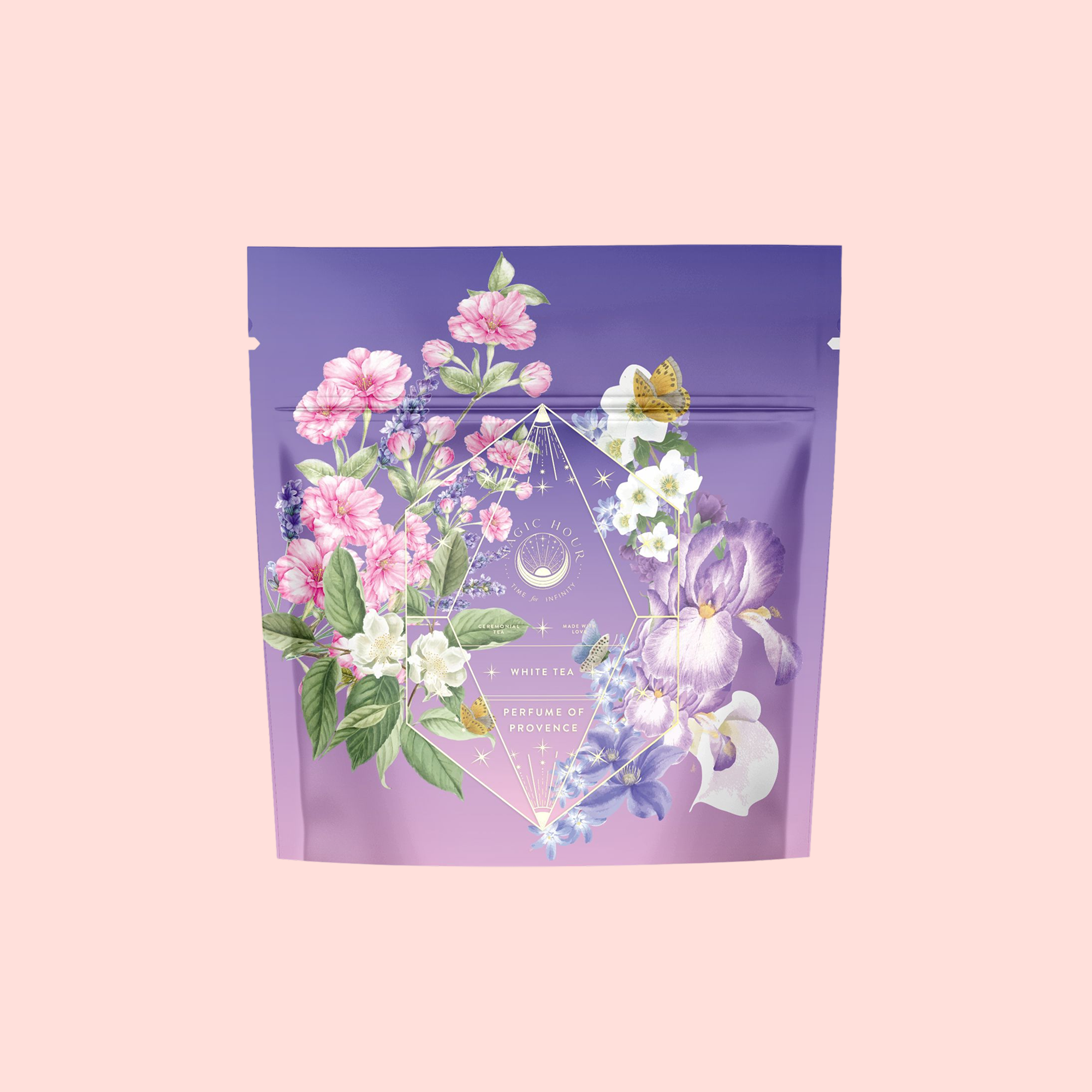 A purple tea pouch with floral art and a yellow butterfly, labeled “Perfumes of Provence: Lavender Bouquet Tea for Calm Moods and Beautiful Skin”—ideal for fans of Provence flower teas.