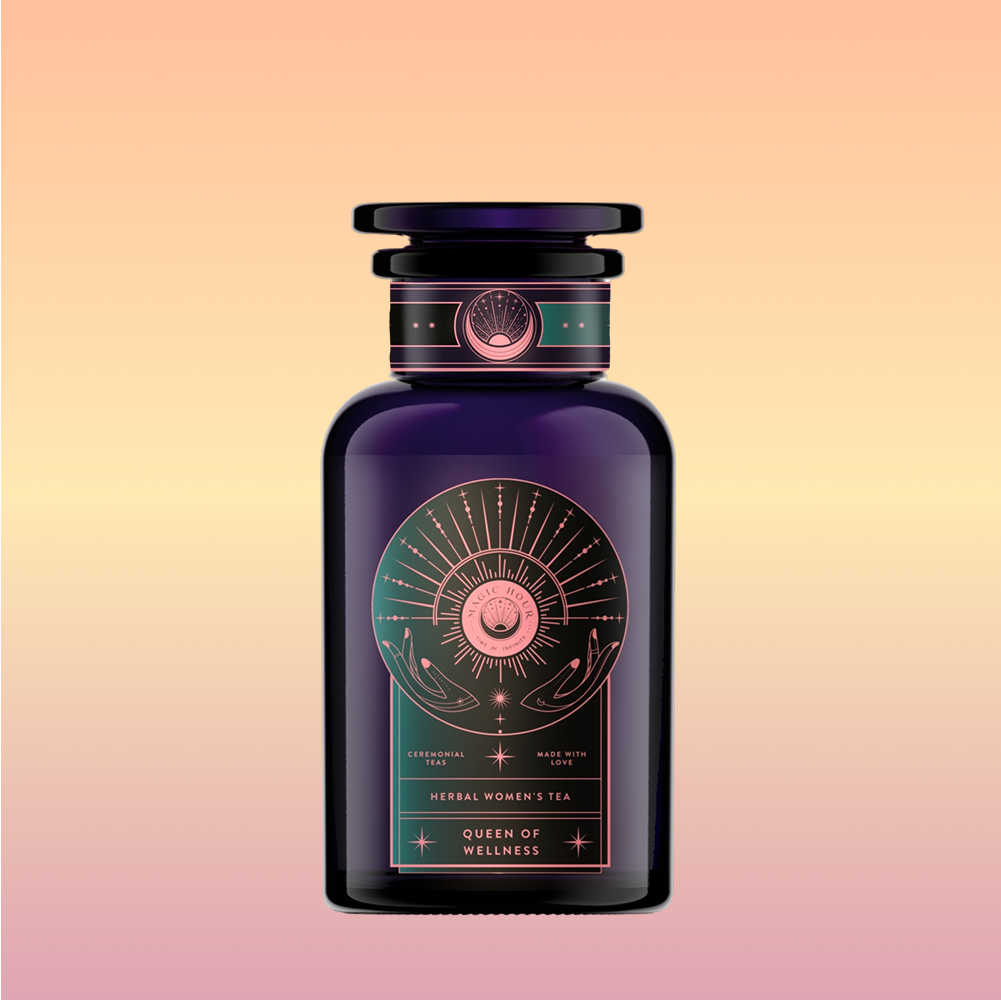 A dark purple glass bottle labeled "Queen of the Rainforest: Cacao-Berry Tea," adorned with gold and pink celestial designs, hints at a vibrant cacao-berry herbal blend—ideal for fans of Guayusa tea—set against a soft pastel gradient background.