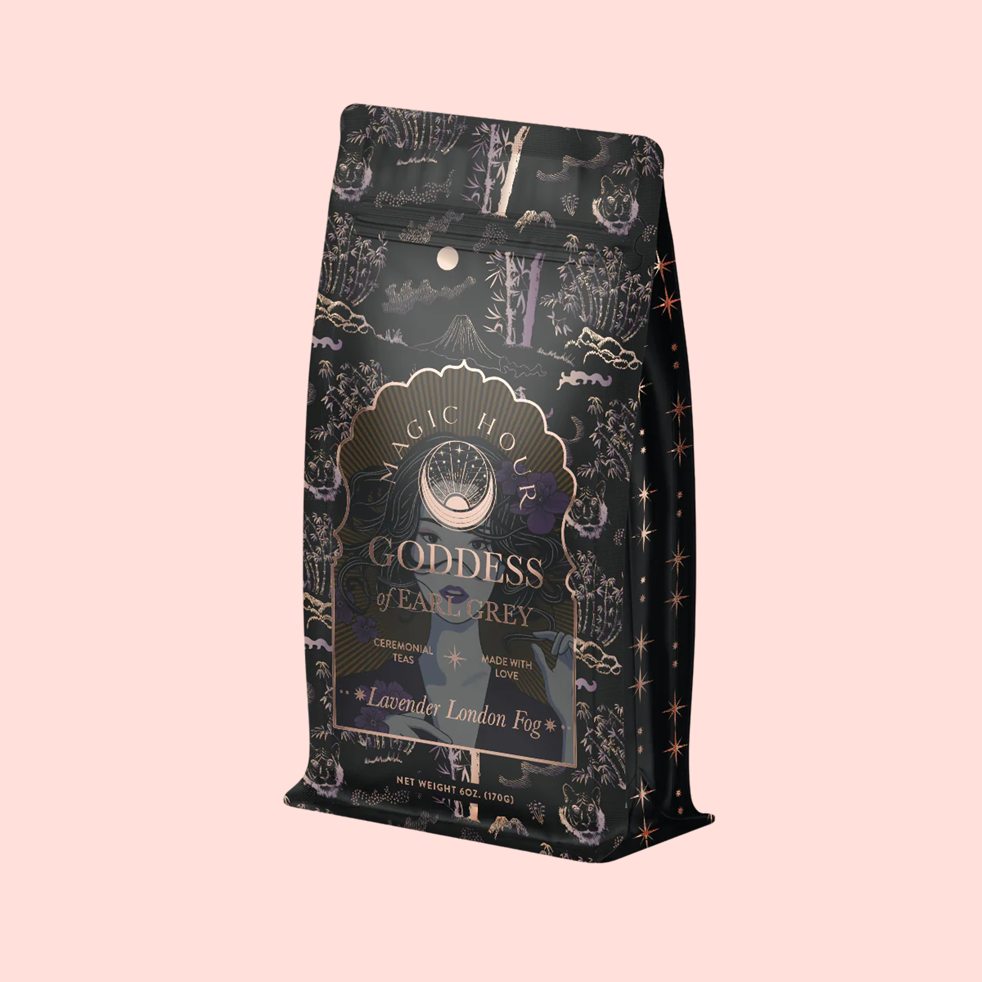 A decorative tea bag labeled "Goddess of Earl: Lavender London Fog – Tea for Blooming Clarity &amp; Calm Moods," with botanical and celestial designs on pink, perfect for a soothing cup of Lavender Earl Grey.