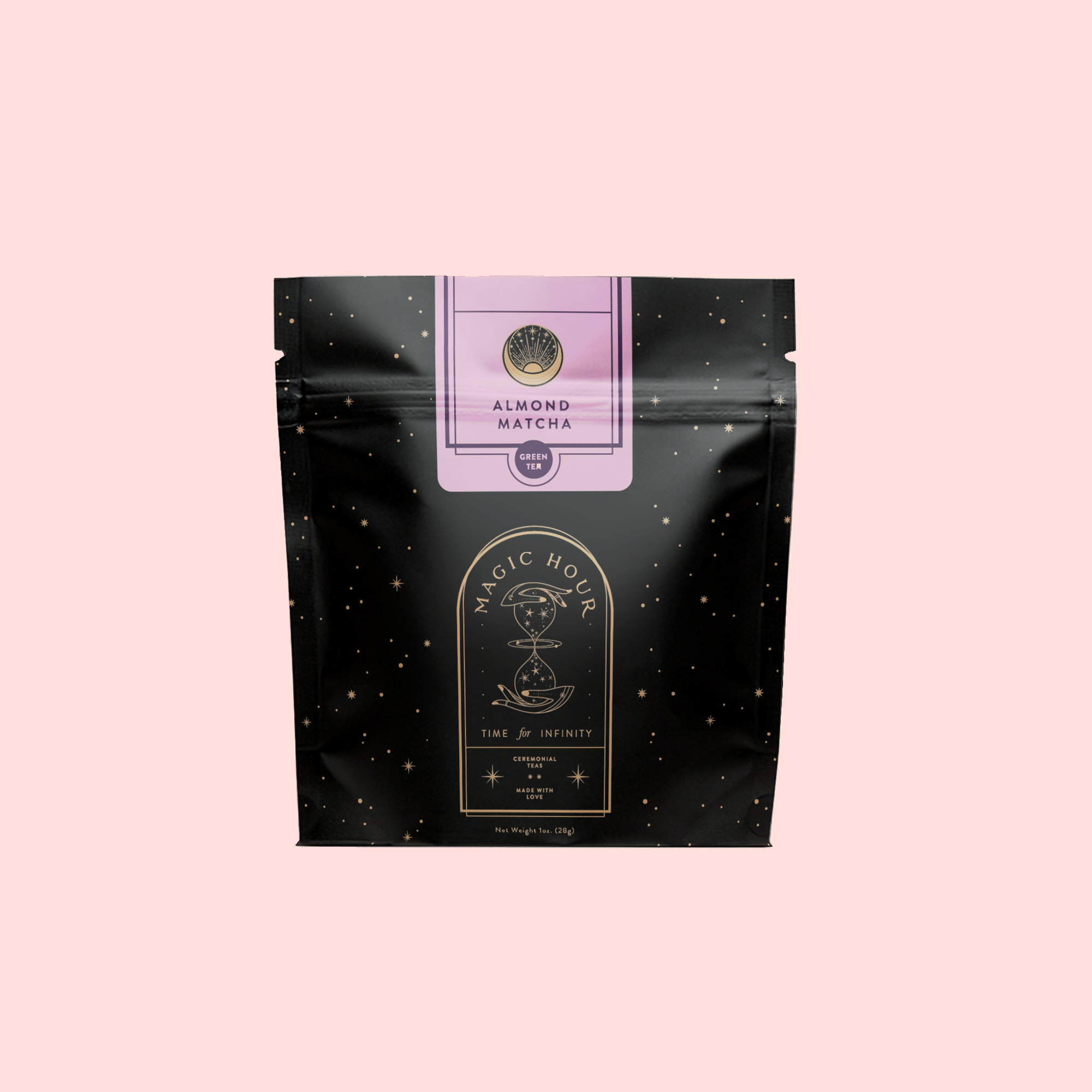 A black, resealable pouch labeled "Almond Matcha Green Tea for Joy" with gold stars, lavender accents, and a circular hourglass logo is shown on a light pink background, highlighting this immune-boosting organic tea.